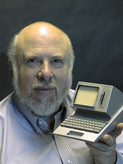 jef_raskin_holding_canon_cat_model