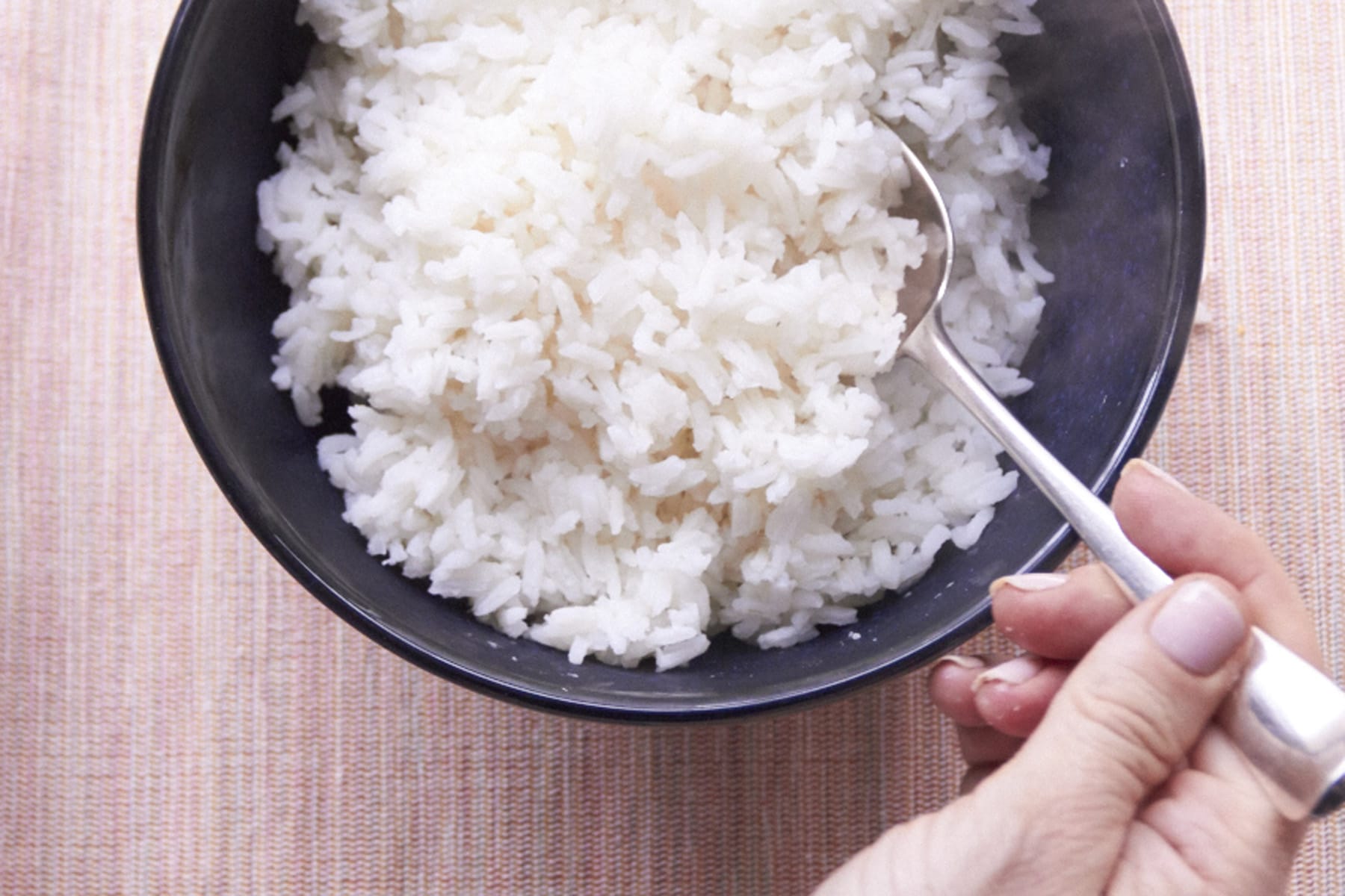 rice in bowl horiz with spoon copy