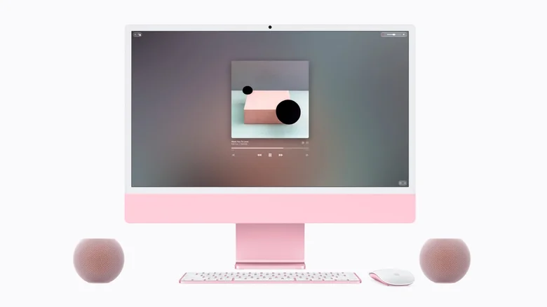 A pair of pink HomePod mini 2 paired with a matching pink iMac.